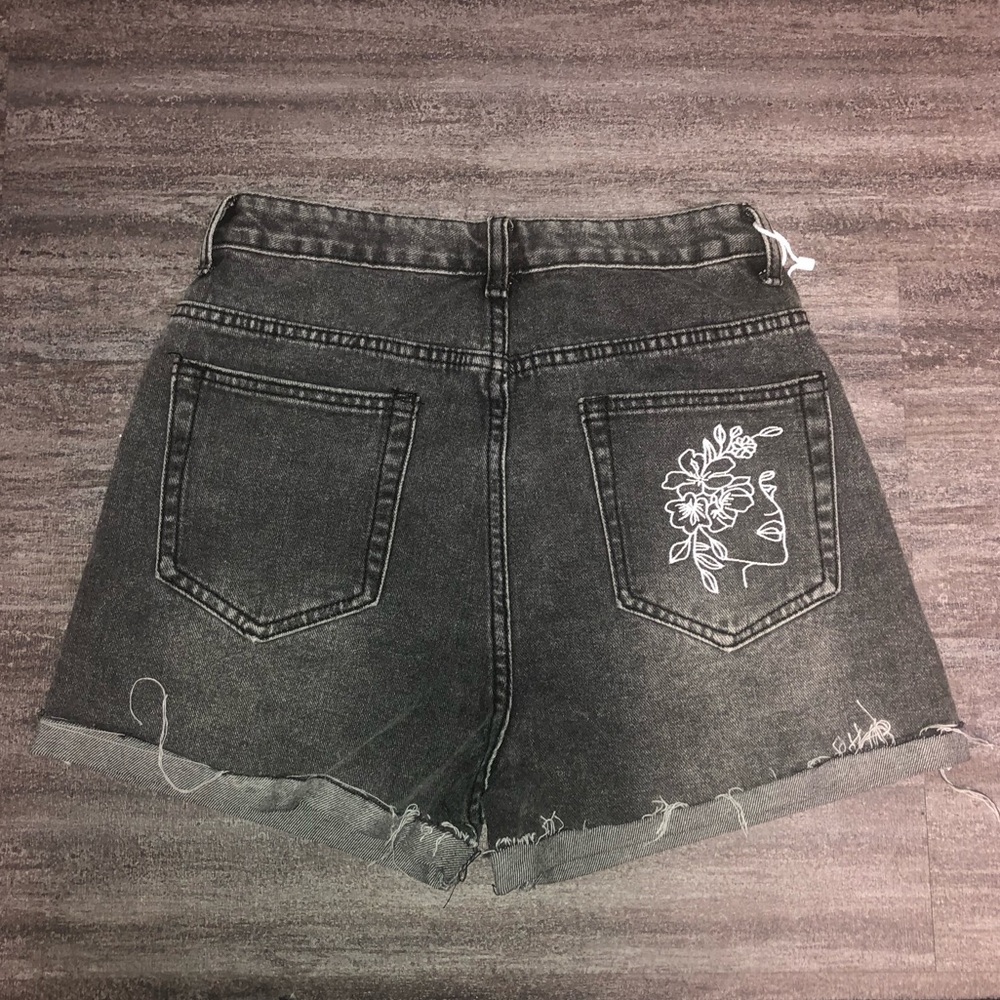 Embroidered black jean shorts